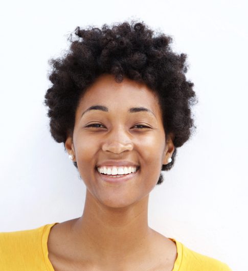 closeup-of-a-smiling-young-black-woman-PJGUSWC.jpg